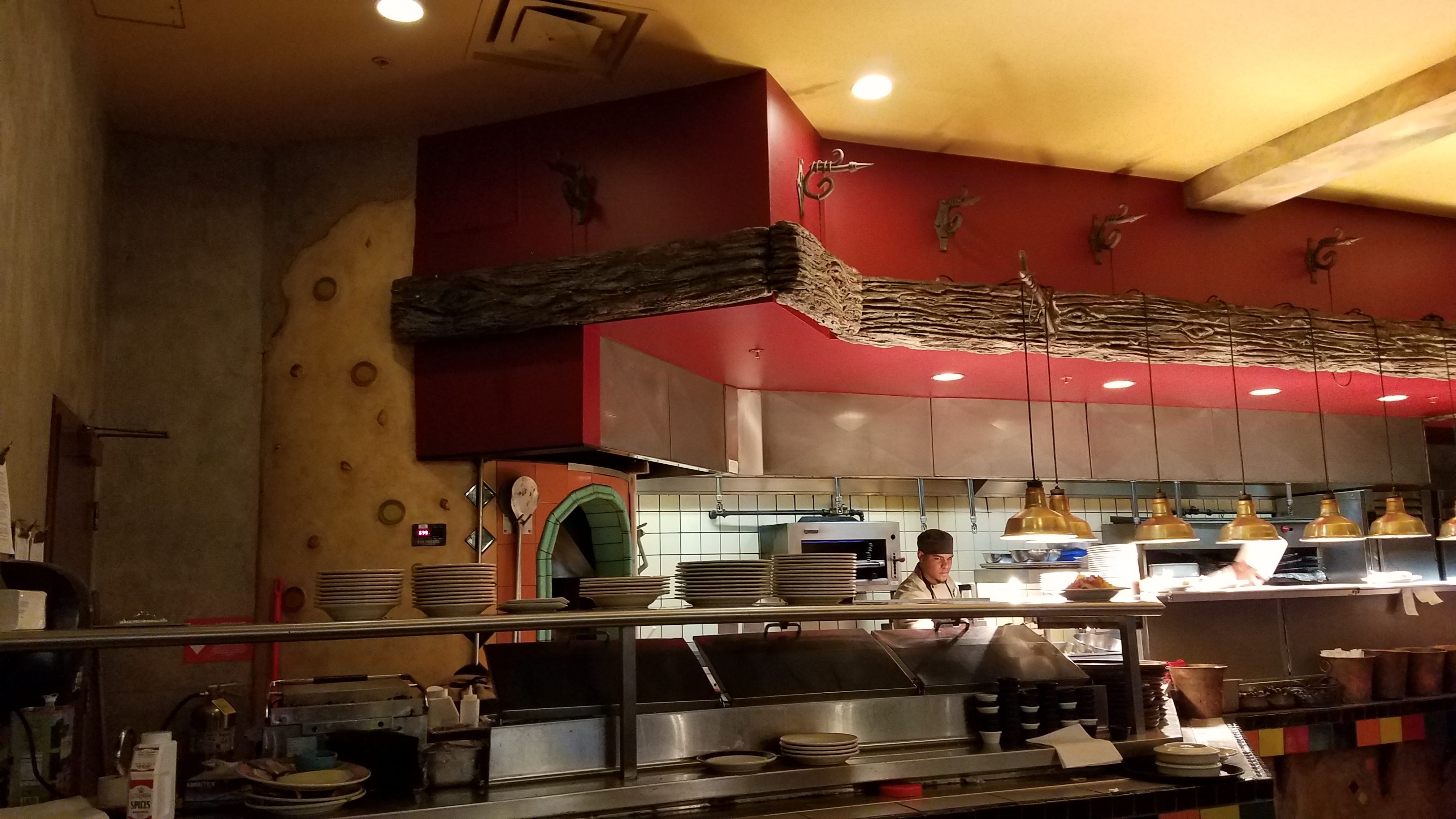Open kitchen at Confisco Grille - Dining Review - Islands of Adventure - Universal Orlando Resort - unofficialuniversal.com.